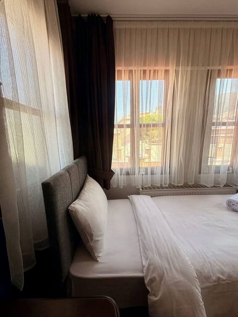 Basic Single Room | Iron/ironing board (on request), WiFi (free)