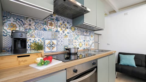 Apartment (1 Bedroom) | Private kitchen | Espresso maker, microwave, oven, stovetop