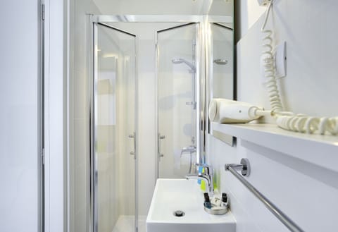 Premium bedding, down comforters, pillowtop beds, in-room safe