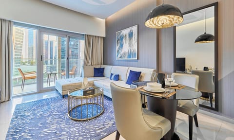 Superior Apartment, Balcony, Bay View | Living area | 55-inch flat-screen TV with digital channels