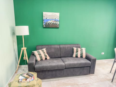Apartment, Balcony, City View | Living area | Flat-screen TV