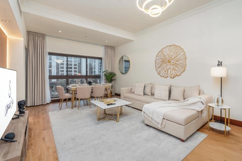 Superior Apartment, Balcony, City View | Living area | 55-inch flat-screen TV with digital channels