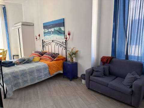 Comfort Quadruple Room, Balcony, City View | Laptop workspace, iron/ironing board, WiFi (free)