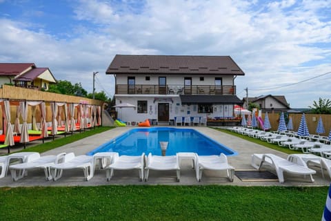 Seasonal outdoor pool, pool umbrellas, sun loungers