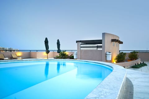 Seasonal outdoor pool, pool umbrellas, sun loungers