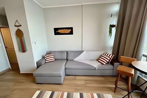 Deluxe Apartment, Balcony, Beach View | Living area