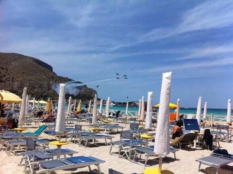 Beach nearby, white sand, beach shuttle
