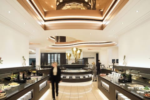 4 restaurants, breakfast, lunch, dinner served; international cuisine