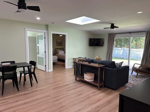 The Cottage, 2 Bedrooms | Living area | 32-inch TV with cable channels