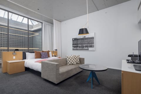 Deluxe Room, 1 King Bed | Premium bedding, down comforters, in-room safe, individually decorated