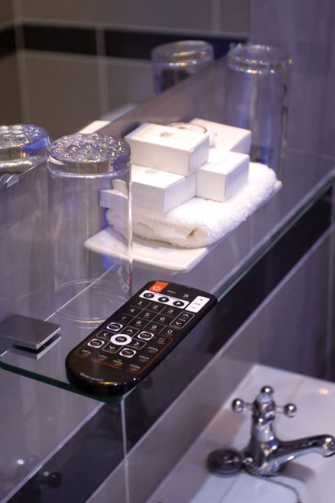 Combined shower/tub, hair dryer, towels, soap