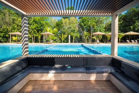 Outdoor pool, pool umbrellas, sun loungers