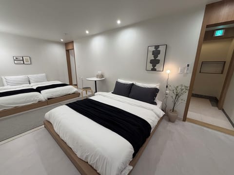 Family Triple Room | Hypo-allergenic bedding available, minibar (free items), desk