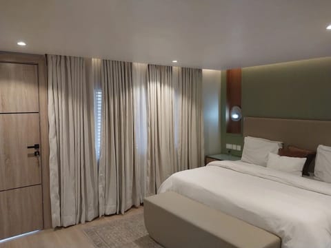 Superior Apartment, Balcony, City View | In-room safe, desk, laptop workspace, blackout drapes