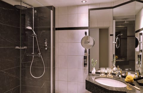 Shower, eco-friendly toiletries, hair dryer, slippers