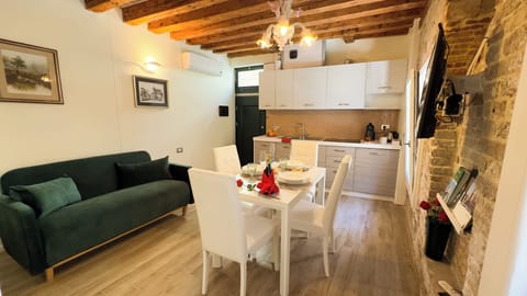 Apartment (1 Bedroom) | Living area | 32-inch TV with cable channels