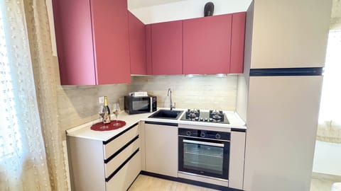 Apartment (1 Bedroom) | Private kitchen | Microwave, oven, stovetop, electric kettle