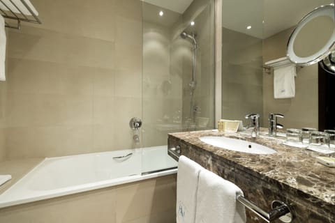 Eco-friendly toiletries, hair dryer, towels