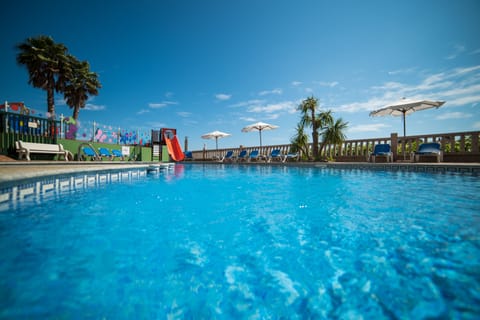 Seasonal outdoor pool, pool umbrellas, sun loungers