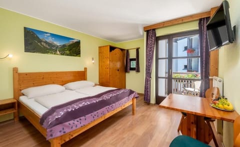 Economy Double Room, Balcony | In-room safe, travel crib, WiFi (free), bed sheets