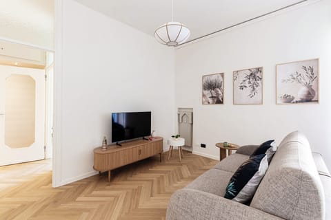 Apartment, City View | Living area | 30-inch TV with digital channels