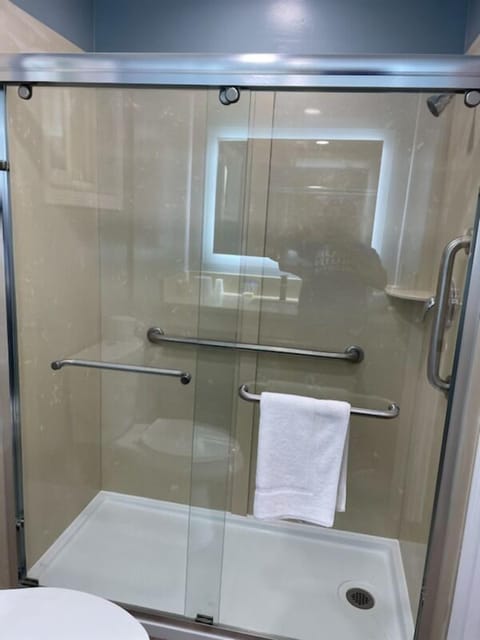 Shower, towels, soap, shampoo