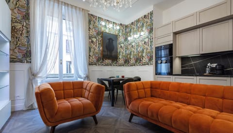 Apartment (2 Bedrooms) | Living area | 32-inch Smart TV with cable channels
