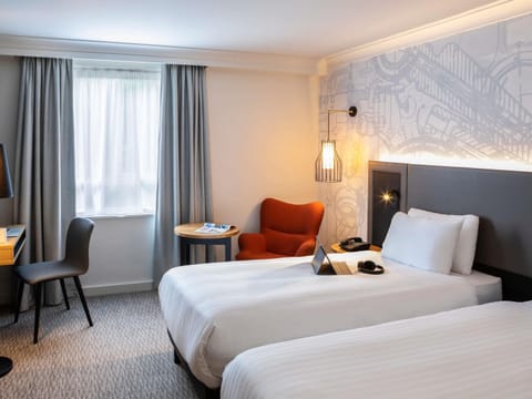 Hypo-allergenic bedding, in-room safe, desk, laptop workspace