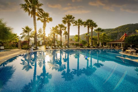 Indoor pool, 2 outdoor pools, open 10:00 AM to 7:00 PM, pool umbrellas