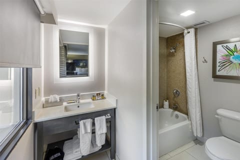 Combined shower/tub, eco-friendly toiletries, hair dryer, towels