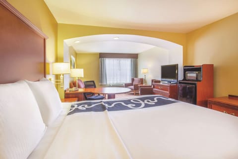 Premium bedding, pillowtop beds, desk, laptop workspace