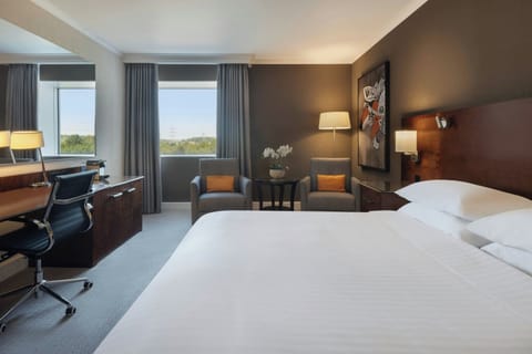 Premium bedding, down comforters, pillowtop beds, in-room safe