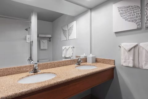 Combined shower/tub, designer toiletries, hair dryer, bathrobes