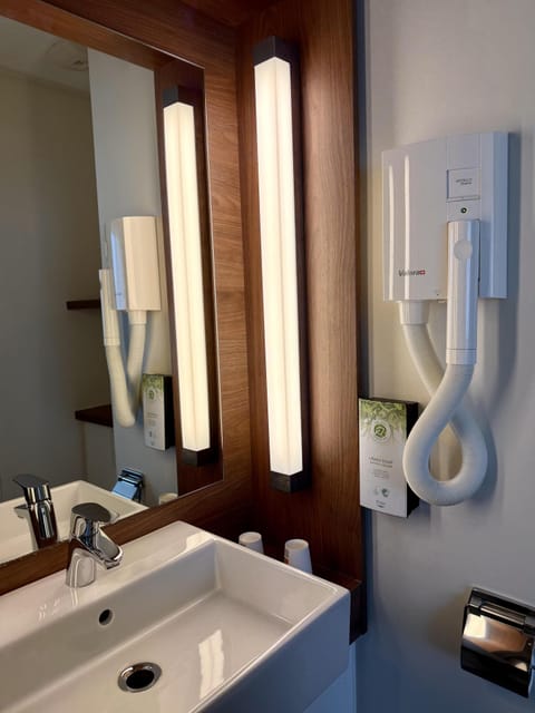 Shower, eco-friendly toiletries, hair dryer, towels