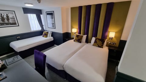 Family Standard Room | Individually decorated, individually furnished, desk, iron/ironing board