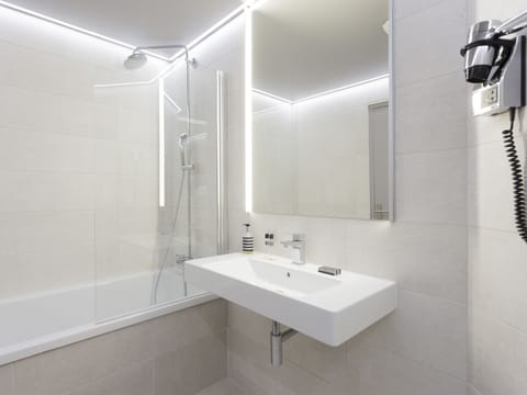 Hair dryer, towels, soap, shampoo