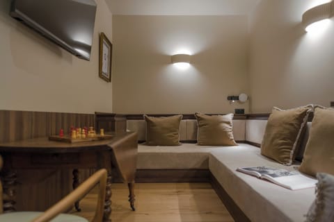 Family Suite, 1 King Bed with Sofa bed, 2 Bathrooms | Living area | 42-inch flat-screen TV with digital channels