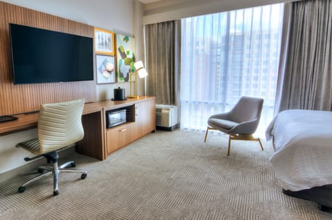 Standard Room | Desk, laptop workspace, blackout drapes, iron/ironing board