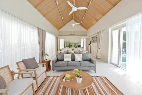 2-Bedroom Pool Villa | Living area | 32-inch flat-screen TV with cable channels, TV, DVD player