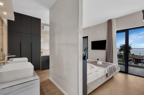 Double Room With Sea/Pool View | In-room safe, desk, blackout drapes, bed sheets