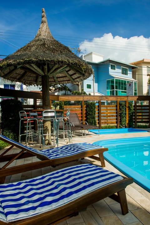 Outdoor pool, open 9 AM to 8 PM, sun loungers