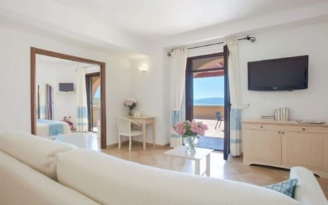 Junior Suite, Sea View | Living area | Flat-screen TV
