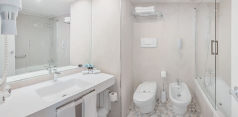 Free toiletries, hair dryer, bidet, towels