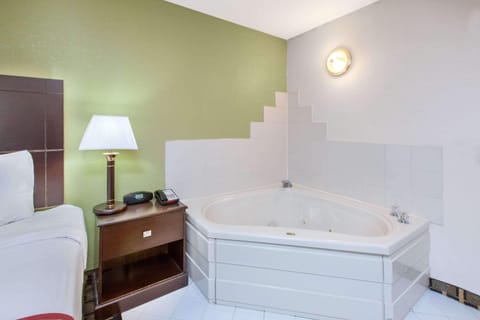 Suite, 1 King Bed, Non Smoking (One-Bedroom) | Desk, laptop workspace, rollaway beds, free WiFi