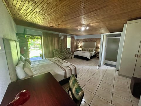 Family Room (Family 4 Sleeper) | Premium bedding, in-room safe, laptop workspace, iron/ironing board