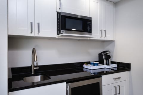 Suite, 1 King Bed, City View (Corner) | Private kitchen | Microwave, coffee/tea maker