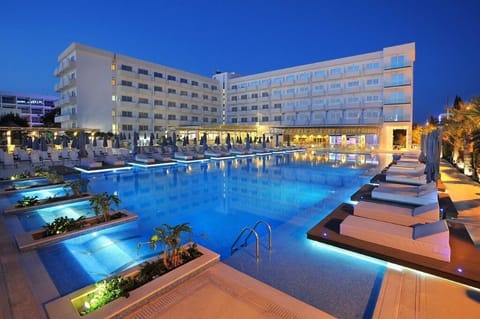 Indoor pool, outdoor pool, open 9 AM to 7 PM, pool umbrellas