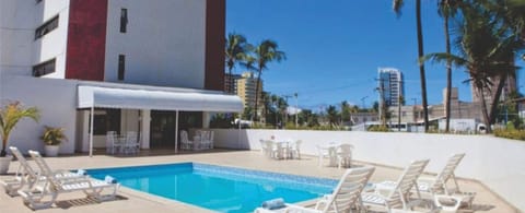Outdoor pool, open 9 AM to 10 PM, sun loungers