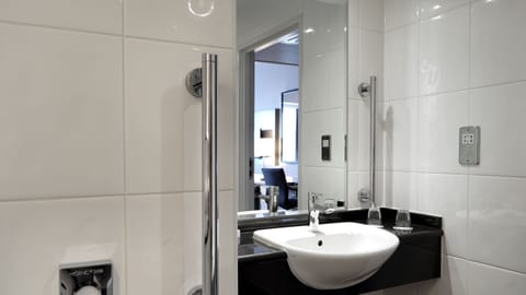 Combined shower/tub, eco-friendly toiletries, hair dryer, bathrobes