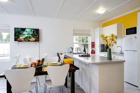 Family Cottage, 2 Bedrooms, Garden Area | Private kitchen | Full-size fridge, microwave, dishwasher, electric kettle